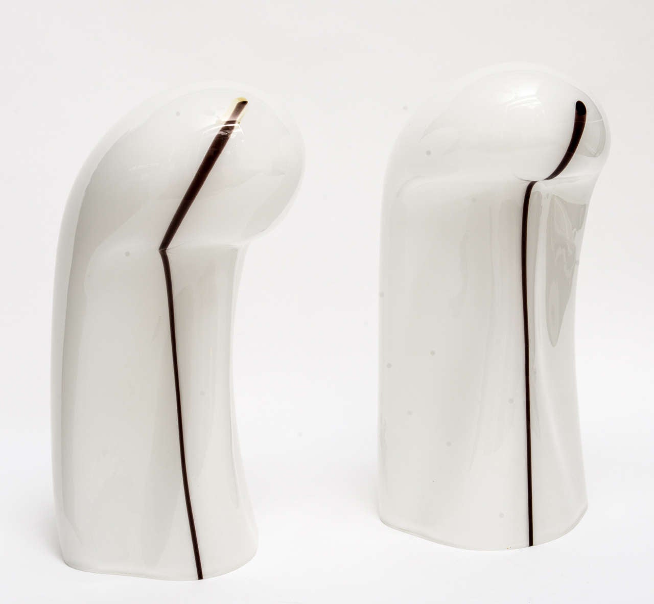 Pair of hand blown white opaque glass lamps named the 