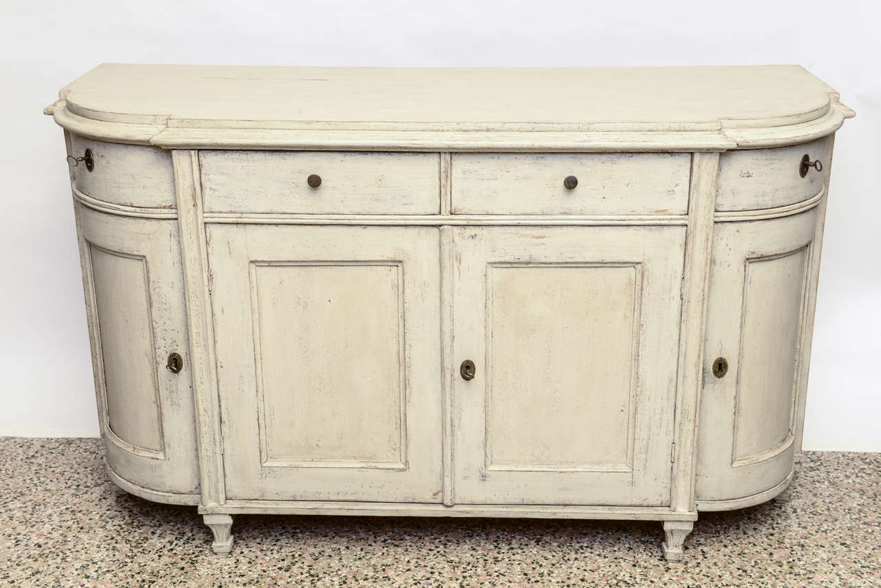 Antique Swedish painted sideboard with rounded corners and small drawers on top.  Early 19th century.  Original locks & hardware.  Refreshed paint in white/grayish color on Pine Wood