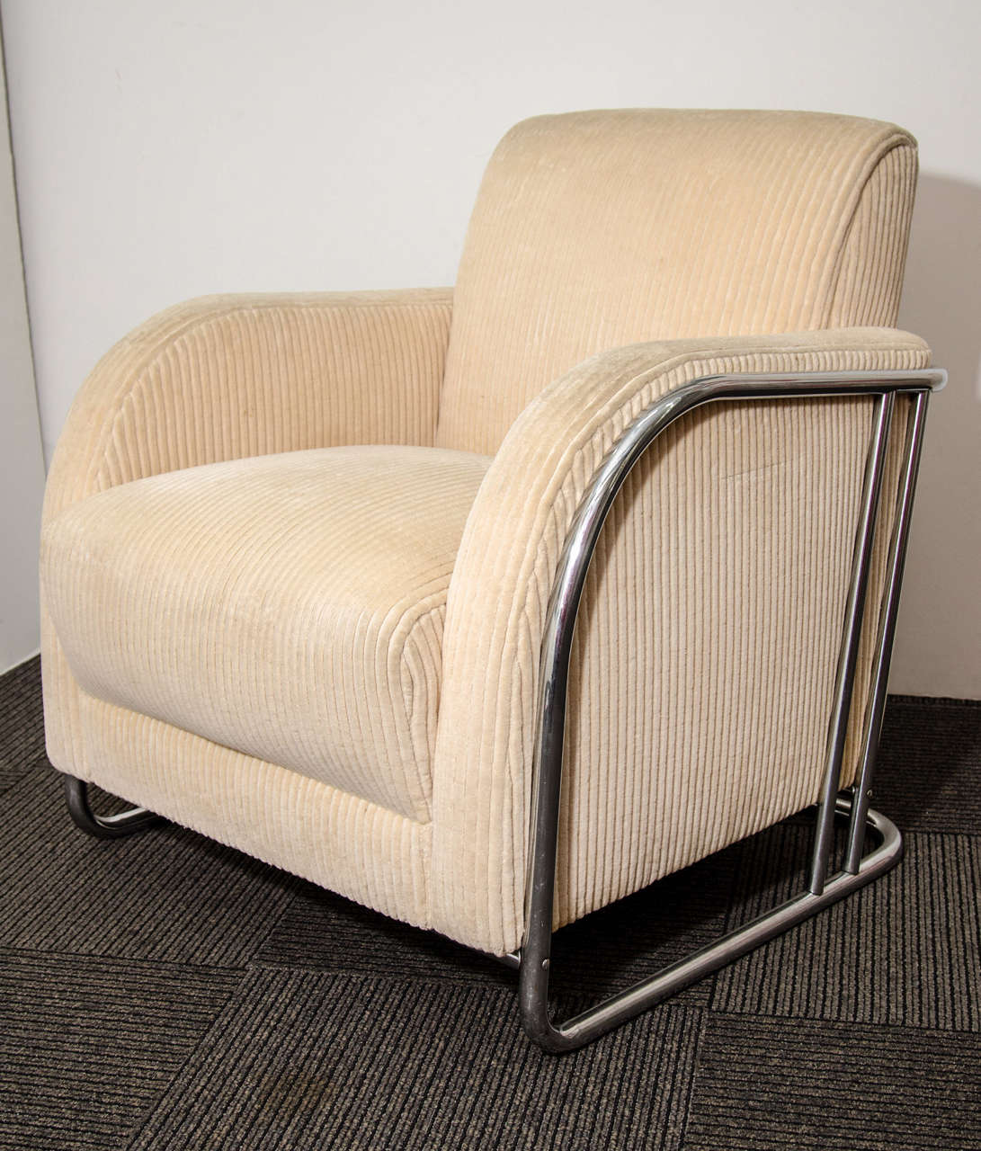 A rare Art Deco lounge chair in white whaled velvet with a tubular steel frame. The piece is by Wolfgang Hoffmann.

Reduced from: $12,750