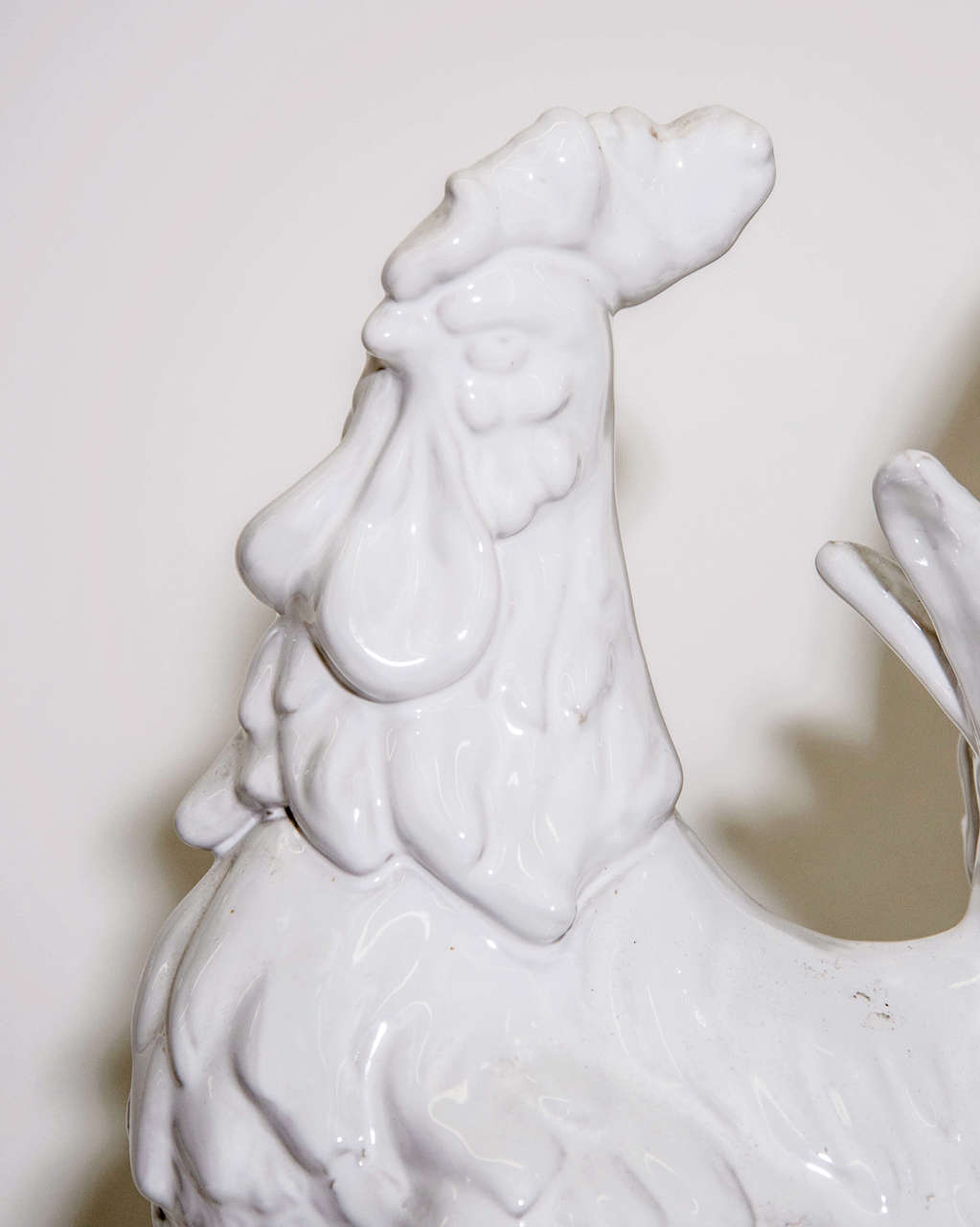 white ceramic rooster figurine
