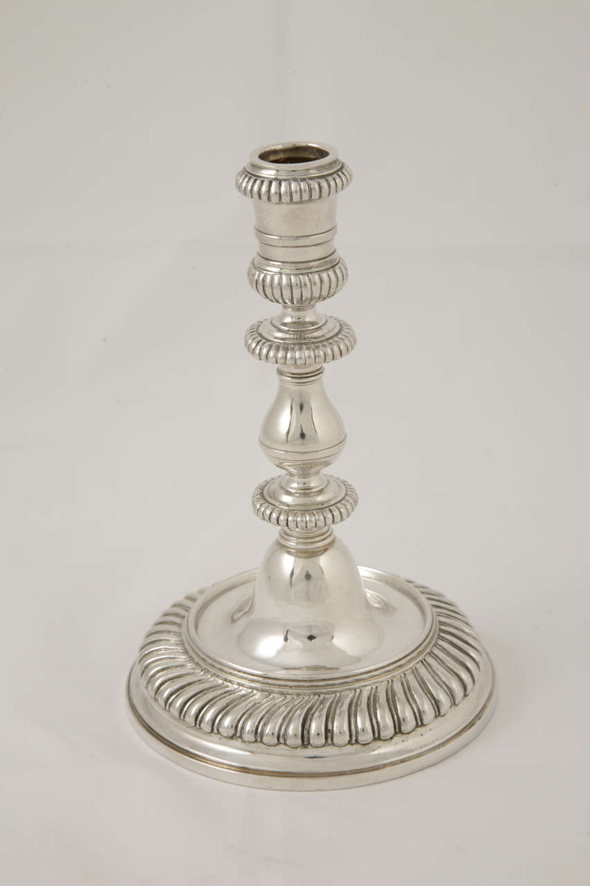A Pair of Sterling Silver Candlesticks made by Wakely & Wheeler in London 1967, in a style originally found in the late 17th century. They extremely heavy, weighing 875gms and are 6.25