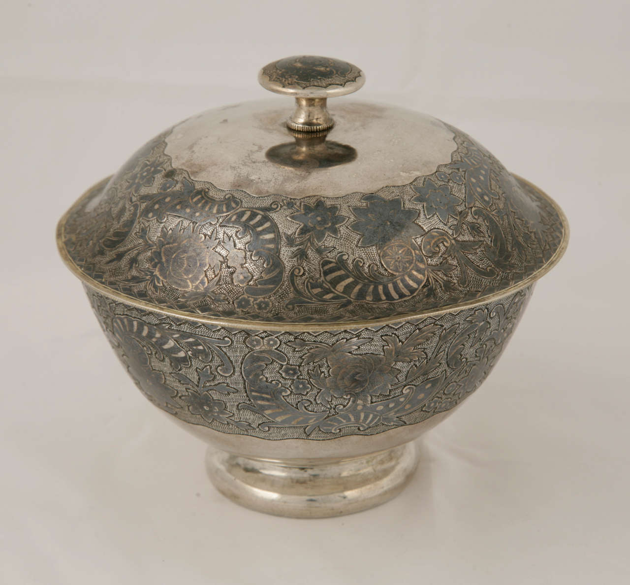 A pair of Caucasian silver and niello covered bowls with gilded interior, and part gilding to the outside. They are of exceptionally fine detail and quality and are circa 1850.
Measures: The weight of the pair is 947gms.
The height is 12cms.