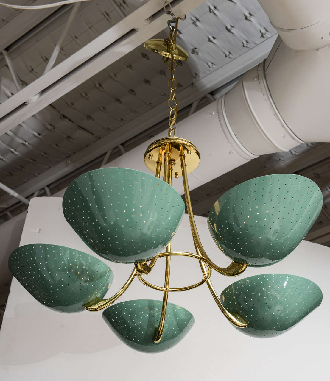 Beautifully restored 50's French Chandelier. Polished solid brass frame with sea-side green perforated metal shades.