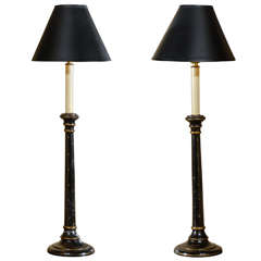 Pair of Black and Gilt Candlestick Lamps