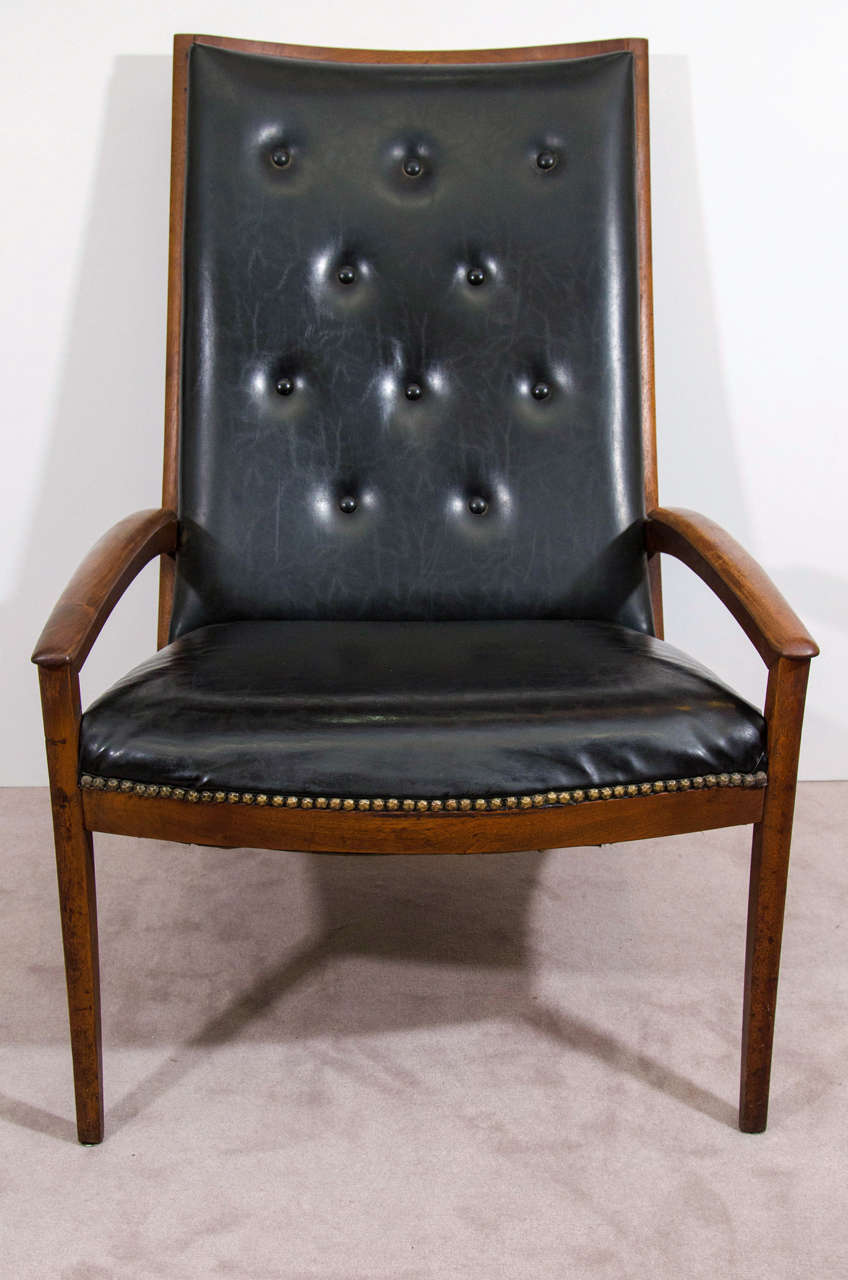 A vintage Parallel Group high back chair in black button tufted Faux leather with nail head detailing by Barney Flagg for Drexel model #995-712.

Good vintage condition with some wear and marks to the upholstery

Reduced from: $3,800