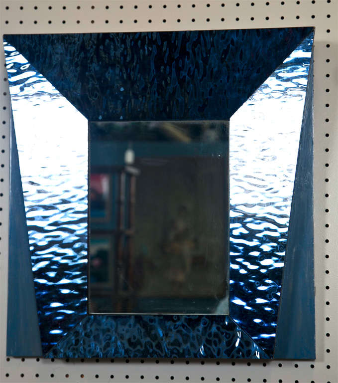 Pair of square blue waterglass framed mirrors with light blue. 
Back lower borders of wood- clear mirror centers.