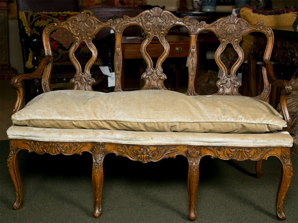 Louis XV style carved oak sofa/settee.