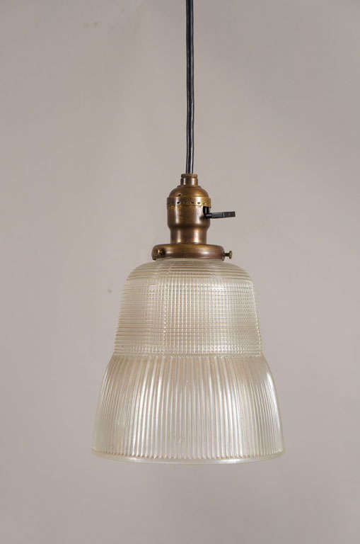 Early glass holophane pendant fixture. Wonderful conical form and patterning make this lamp rare and unique