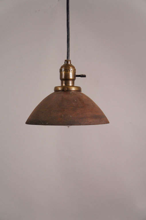 Antique spun metal shade with silvered interior and warm brown painted exterior.  All original.  Black rubber cord with turnkey socket, ceiling cap included.