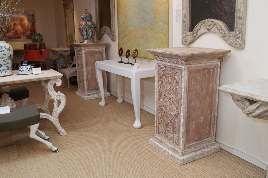 A Pair Of Carved Plinths
