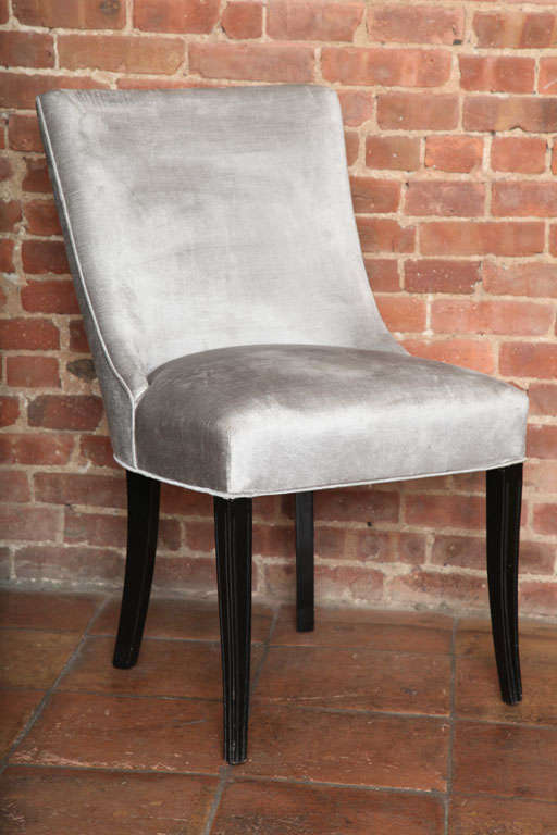 The Mid-Century slipper side chair is in the manner of Billy Haines. It's elegant and comfortable. Sleek and stylish. Their slender legs and high back make them a very chic pair. Perfect to create an elegant entrance or focus corner. Price is by the