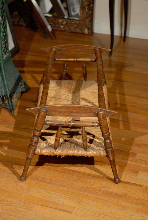 This is a beautiful cradle.  The patina is warm and lovely.  The cradle is built with wood spindles and woven bottom.  This is a very interesting piece.  Although it is a cradle, it can be used for many other things.
 
Dearing Antiques was
