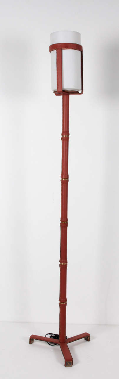 Pair of stitched leather floor lamp
