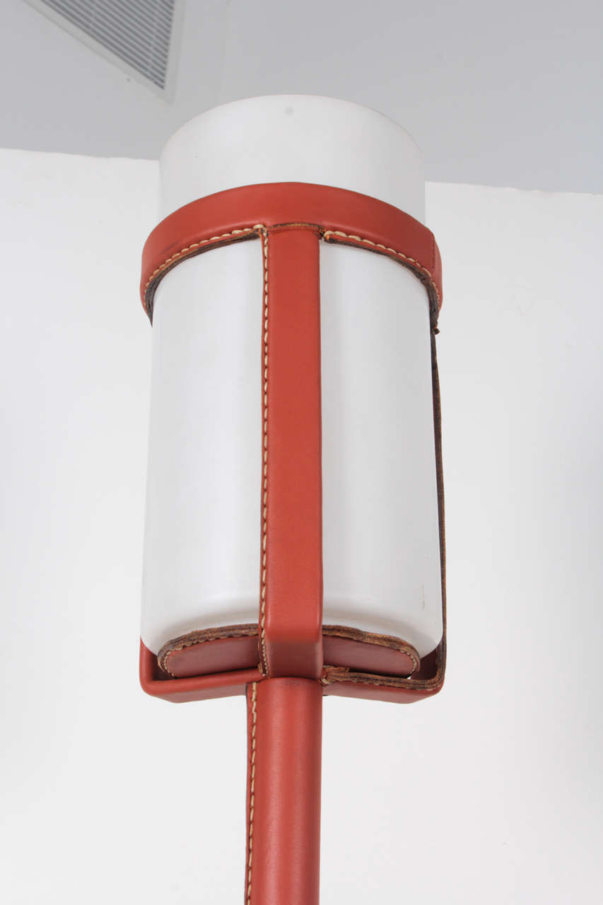 Pair of 1950's floor lamp by Jacques Adnet 1