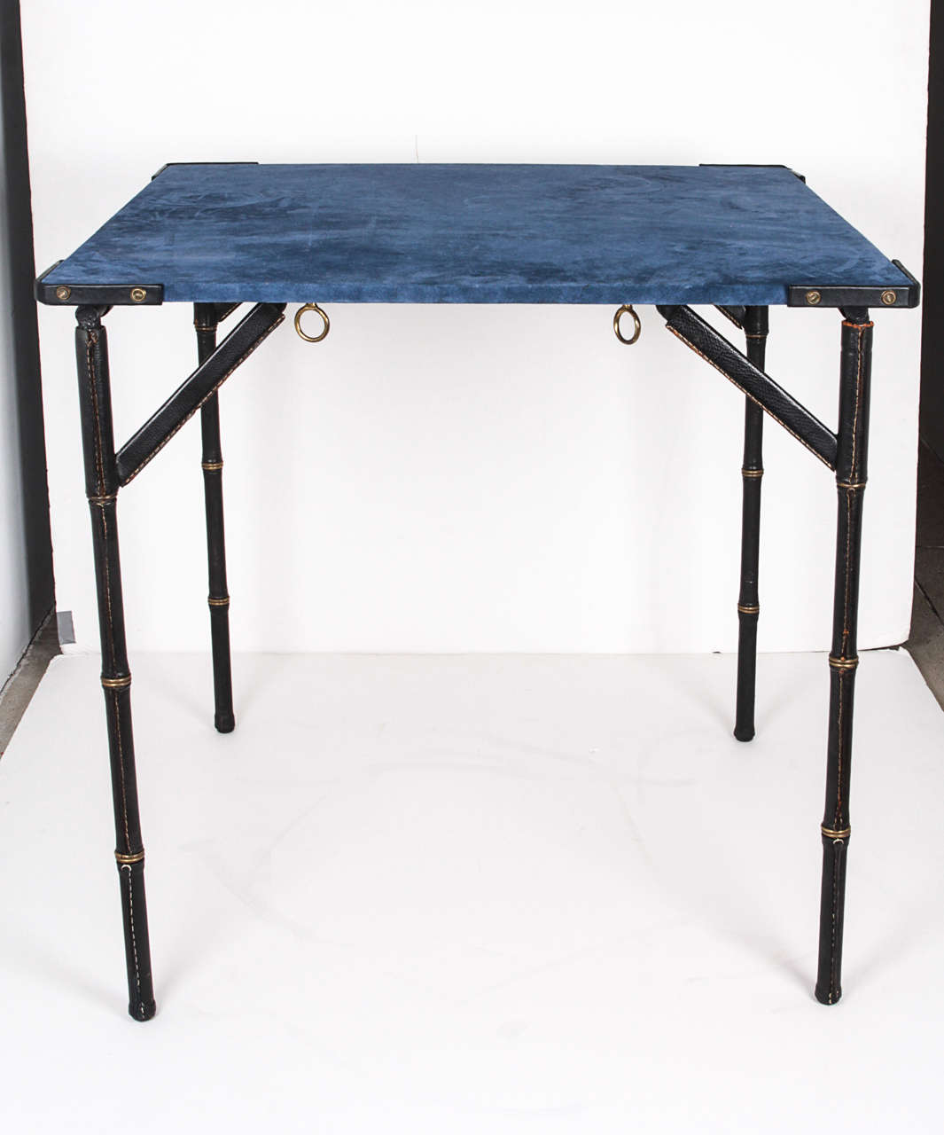 1950's stitched leather game table
covered with  blue suede top