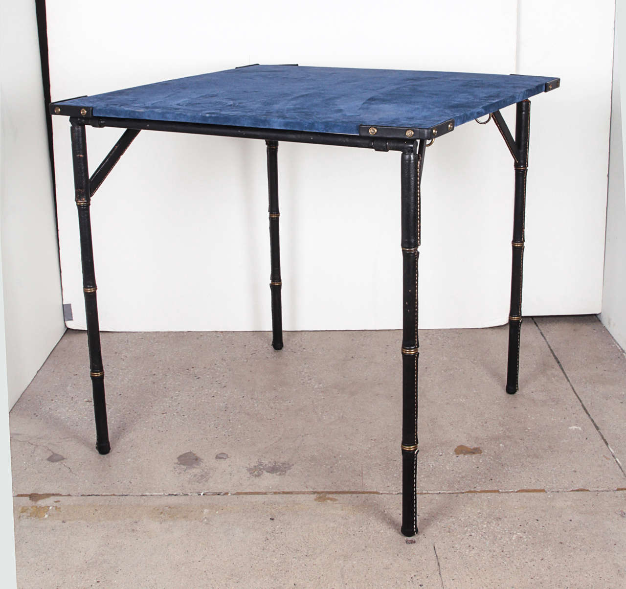 Suede Game table by Jacques Adnet