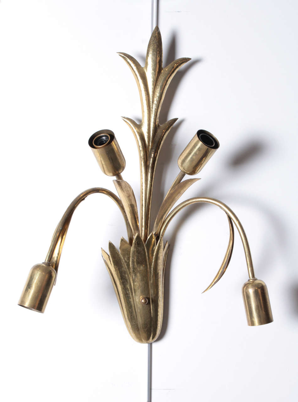 Unusual brass Italian sconces
Two pair available.