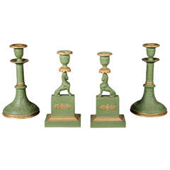 A Collection of Italian Colored Bisque Empire Style Candlesticks