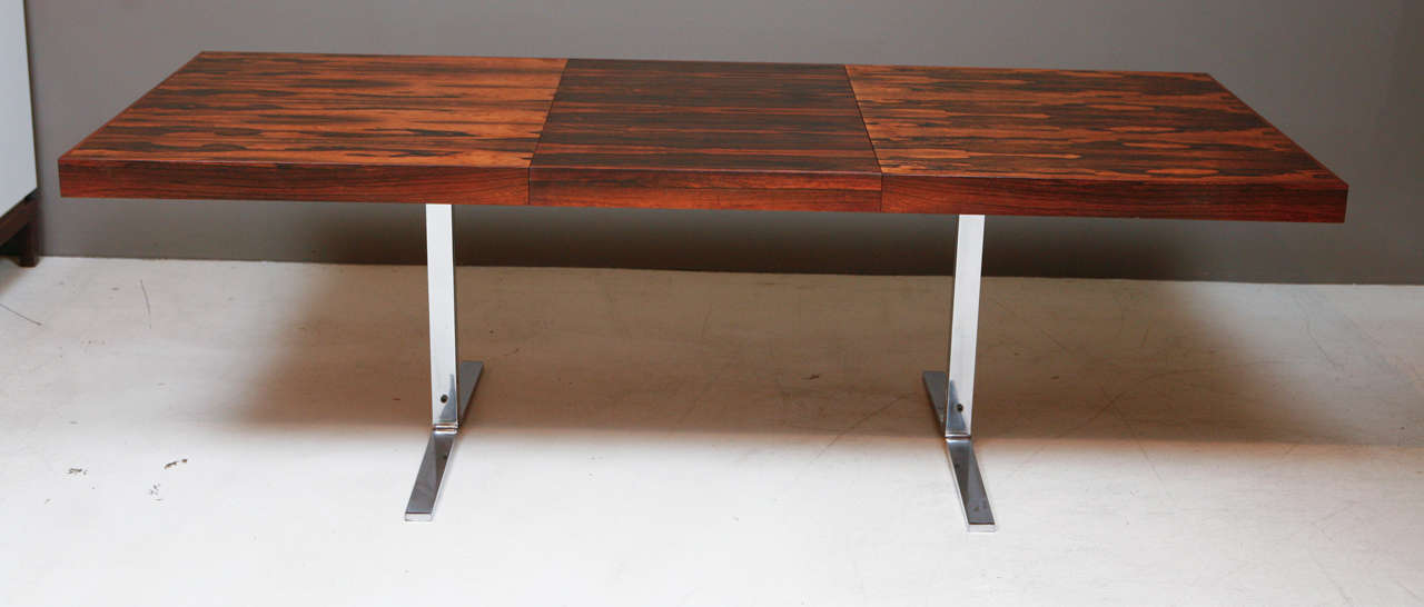 Rosewood Dinning Table with folding hidden leaf by Georg Petersens.  Heavy Tressel base.