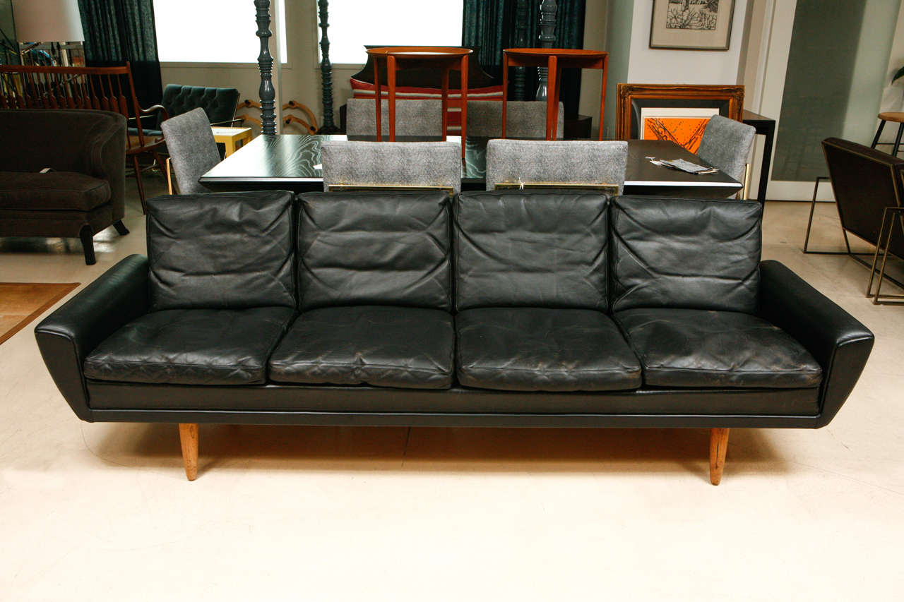 G. Thams Designed Sofa. Model: 64/4. Soft black leather and solid teak legs.