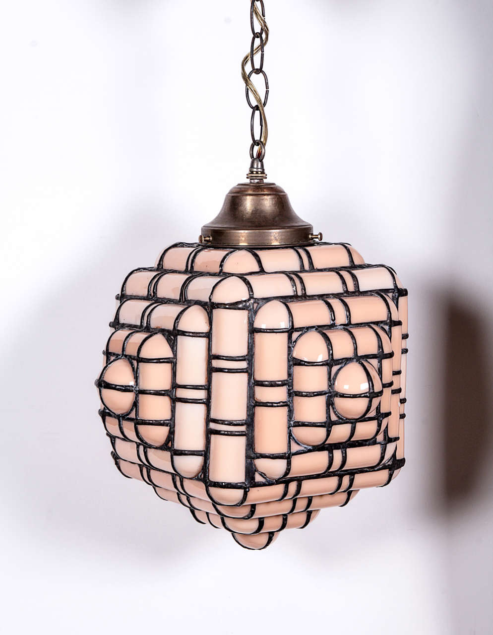 Honeycomb-patterned mosaic glass light fixture by artist Adam Kurtzman. USA, late 20th Century.  Signed.  Two available; priced individually.  Please note that the color of the glass on each light varies slightly.

Item may be viewed at the
