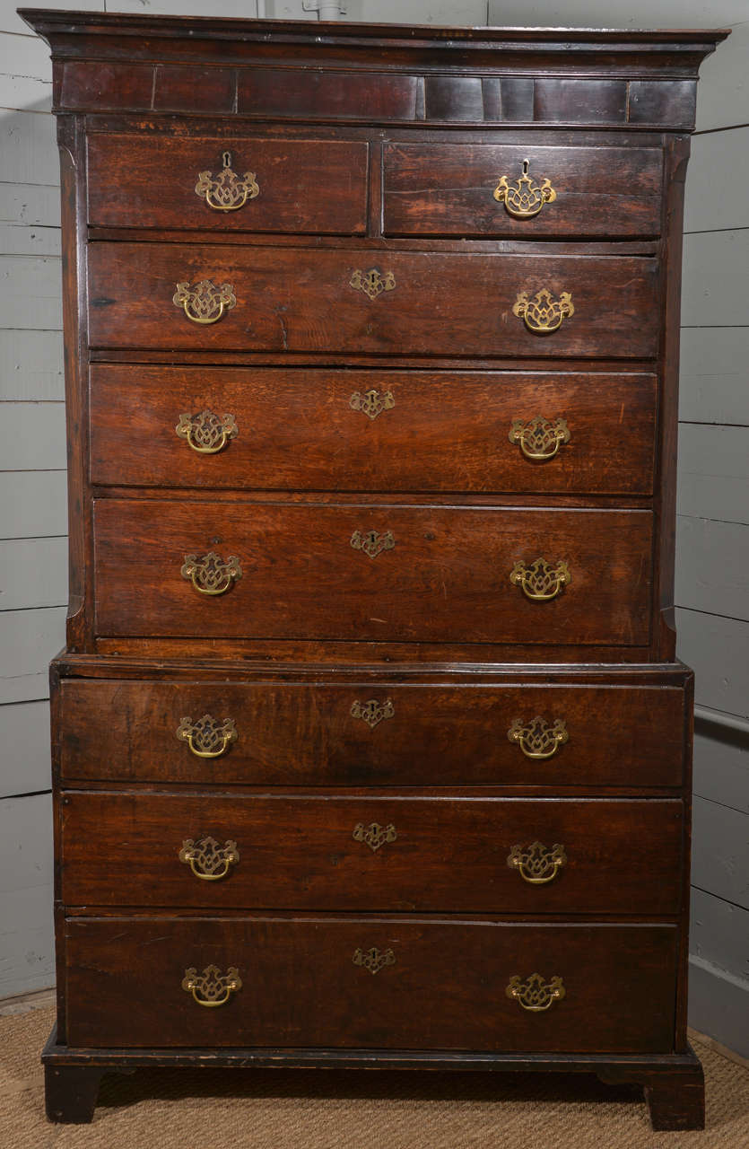 Classic British country, oak tall chest (chest-on-chest), circa 1770-1780, with later hardware and expected wear, patina and wood shrinkage.