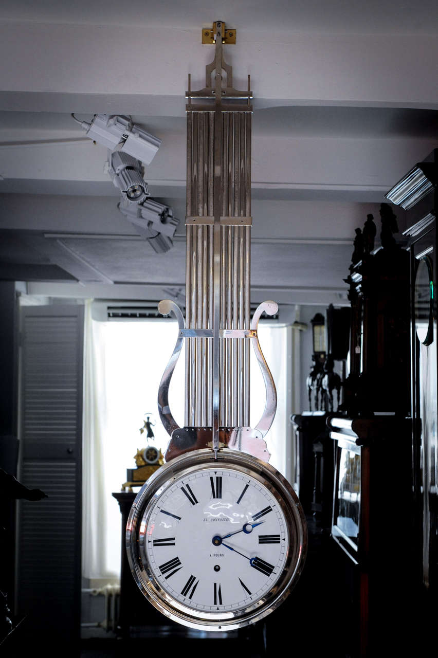 A French nickel 'à double face' regulator timepiece with oscillating movement