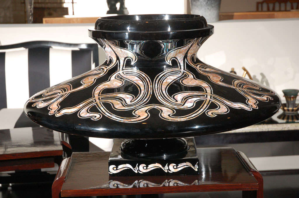 Black lacquer decorative planter with prnate mother of pearl inlaid details. 
Signed and Numbered by DK Home with C.O.A
