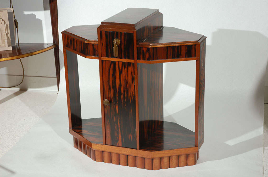 Stunning French Art Deco occasional table in macassar ebony with mother of pearl inlay and great marquetry by Louis Majorelle.  His use of exotic woods and finest detailing makes him one of the greatest artisans of the Art Nouveau and Art Deco era. 