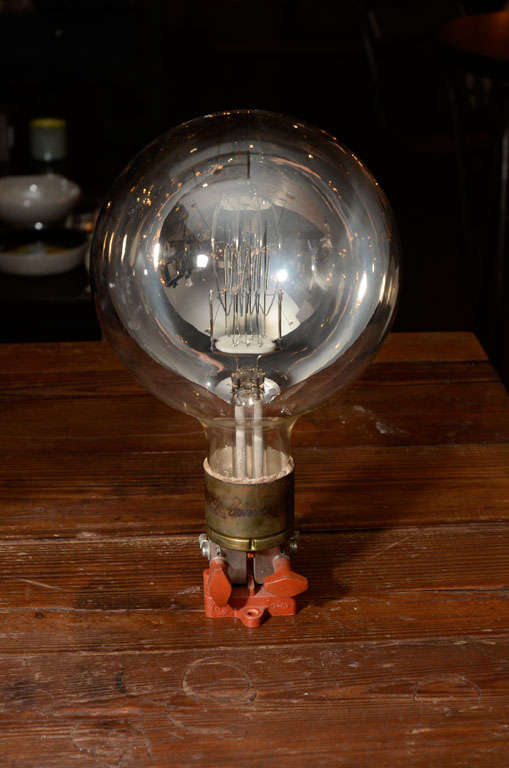 Once industrial light bulbs with an amazing 3000 watts flowing through them, these now vintage mirrored light bulbs will light up any room with electrifying conversation.