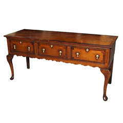 Antique English oak cabriole leg dresser base.