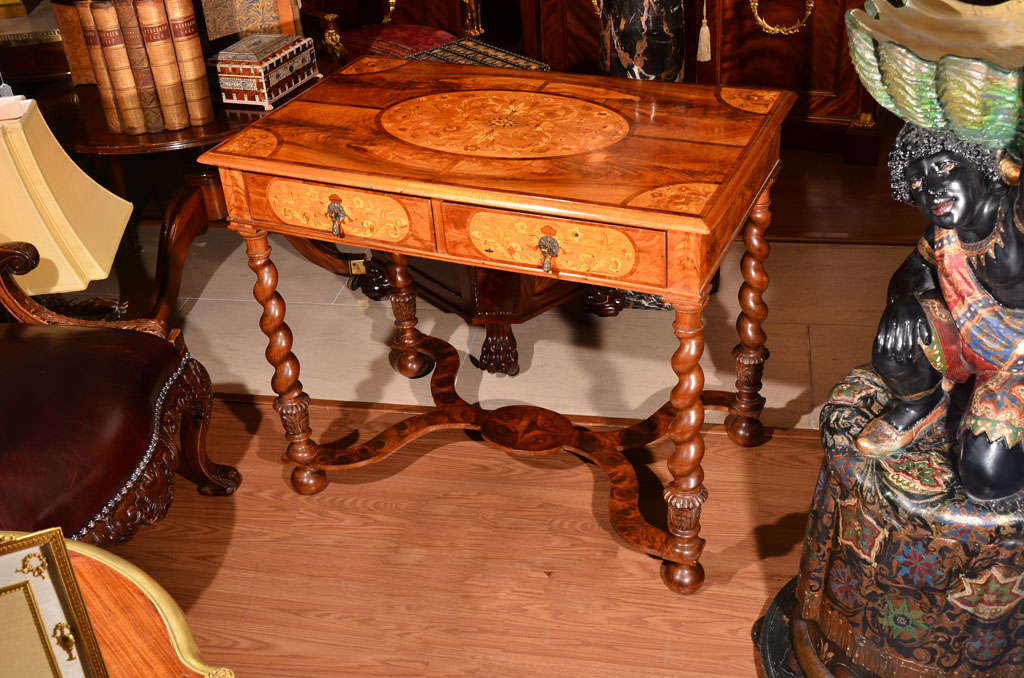 Early 19th c William and Mary walnut and satinwood inlay side table The table has boxwood inlay of birds. Barley twist legs and a burled walnut stretcher base