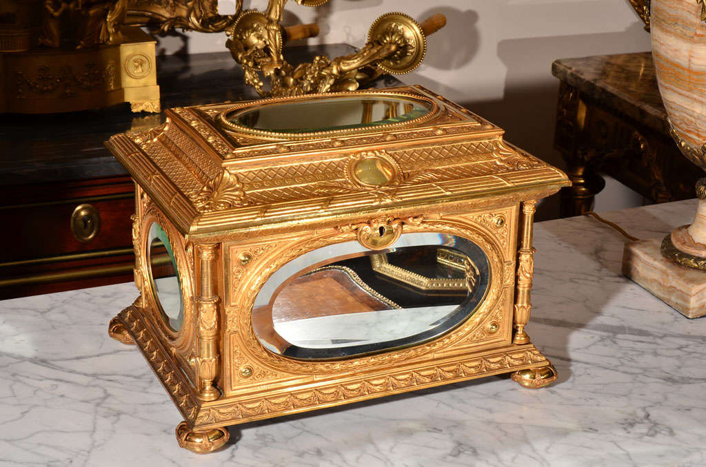 19th c French bronze dore large table box with mirrored plaques . Lined interior