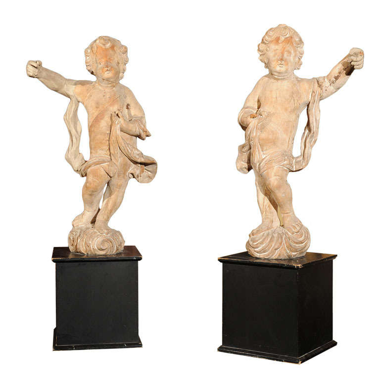 Pair  Of 17th  Century  Carved  Wood  Putti For Sale