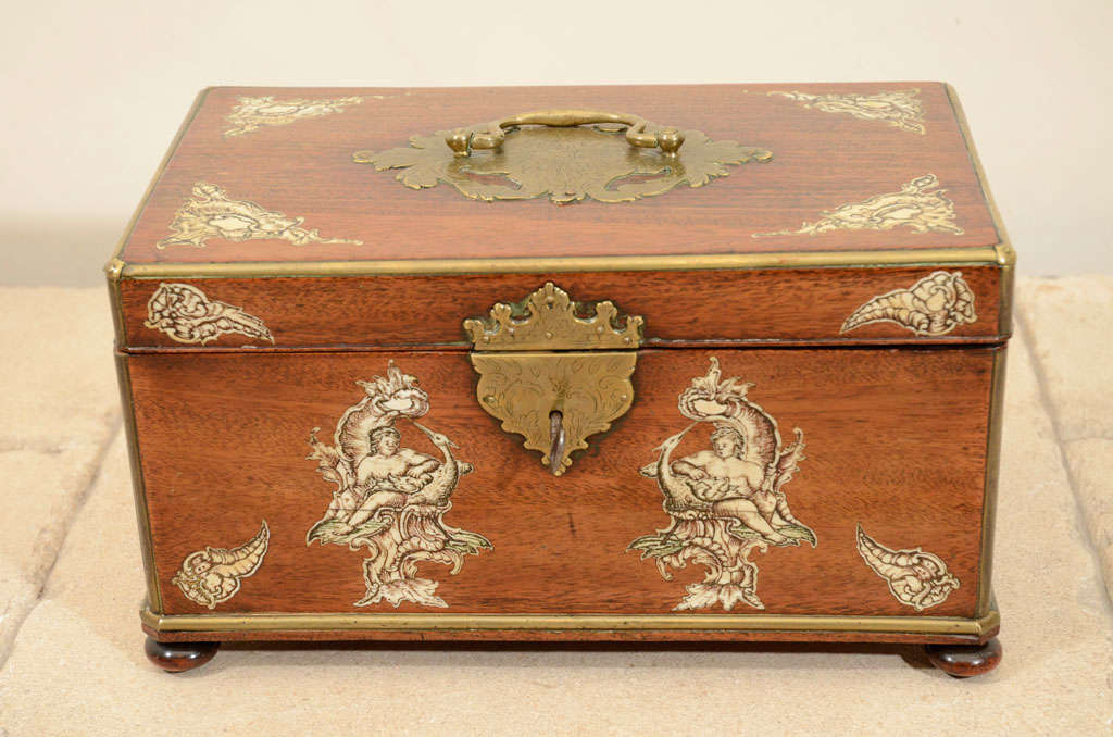 A fine mid 18th century German brass bound mahogany box with engraved ivory inlay and engraved brass escutcheon and cartouche, in the manner of Abraham Roentgen