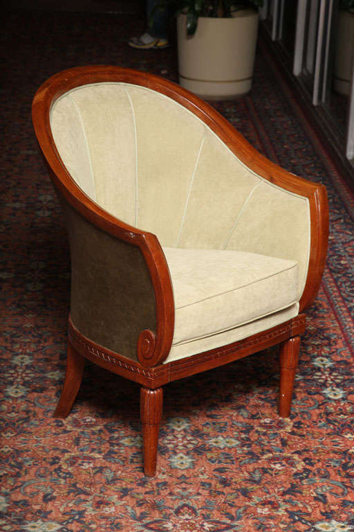 Sue et Mare.

Louis Sue (1875-1968) and Andre Mare (1885-1932).

An elegant high Art Deco armchair in mahogany, circa 1920. The back covered with green leather, the front upholstered with light green suedette.

Measures: H 36 ¼, L 27, D 25 ¼