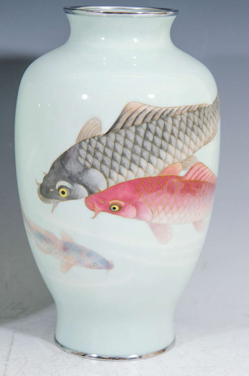 An exquisite pair of Ando Jubei studio Japanese Cloisonné vases circa 1930. Extraordinary details of fish. Vases are wire and wireless Cloisonné.