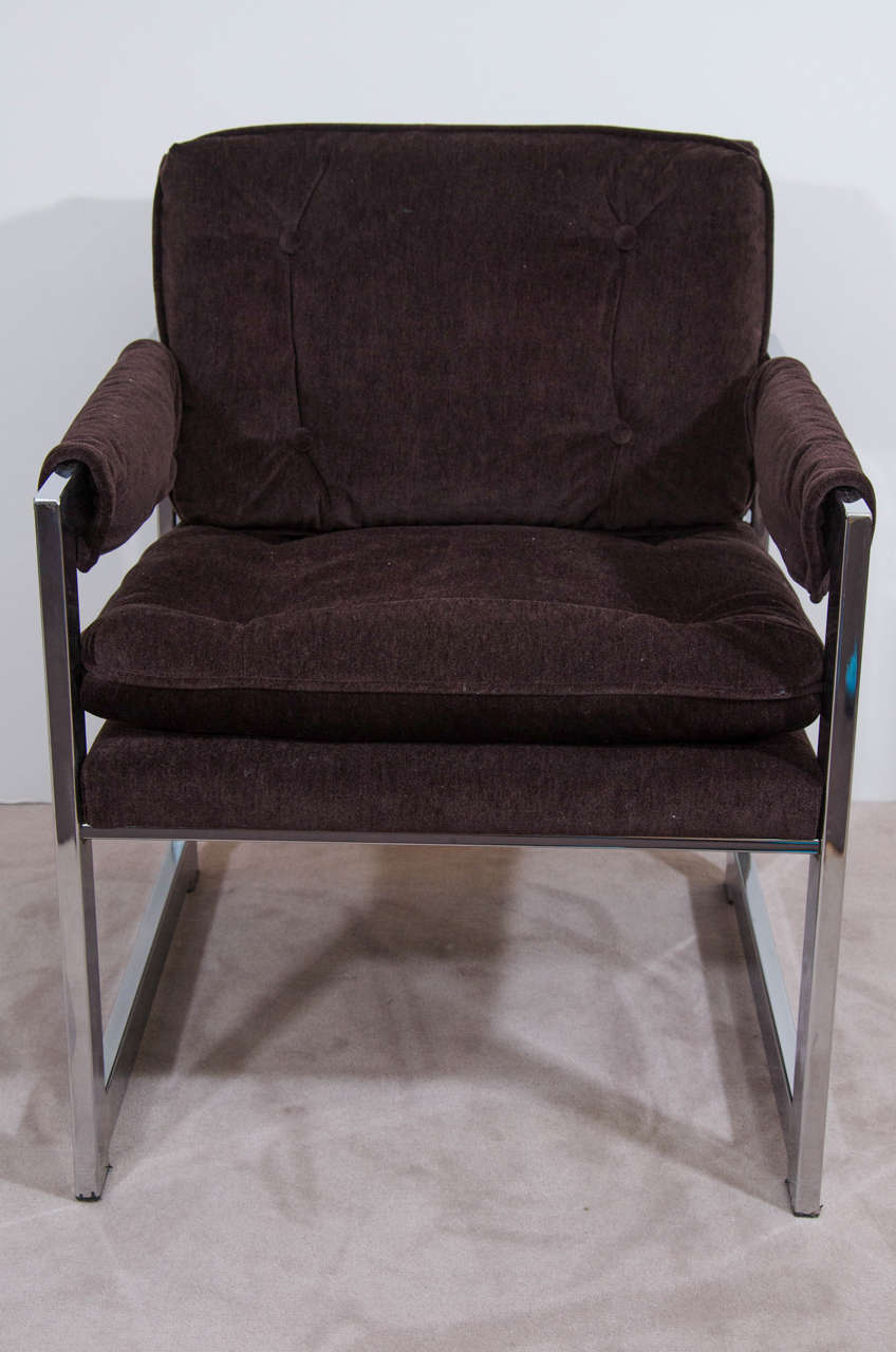 A vintage pair of circa 1960s Milo Baughman chrome over steel frame armchairs newly reupholstered in brown mohair. Arm pads can be taken off.