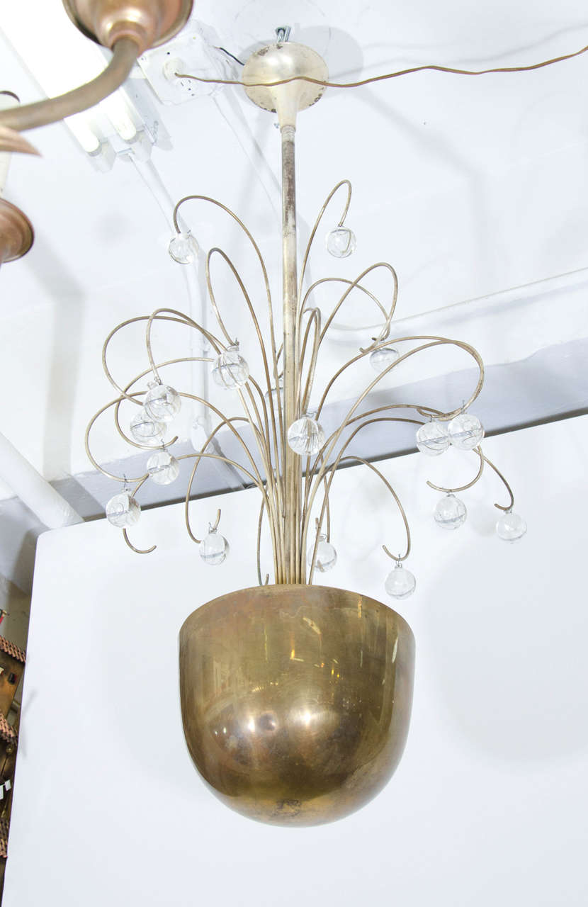 1940s silver plate over brass chandelier formed with a spray of cascading elements with glass ball drops. Fixture inside the center takes six Edison bulbs so you can have a great uplight highlighting the glass ball drops. These have age appropriate