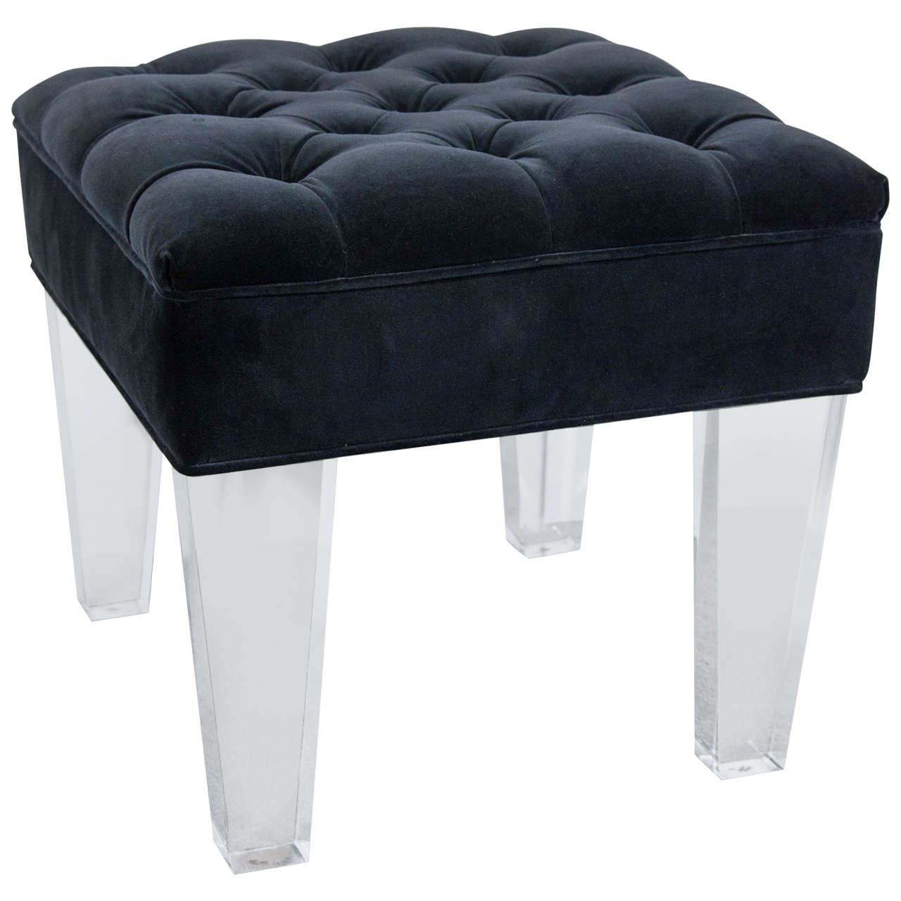 A vintage pair of button tufted black velvet stools with Lucite legs by designer Michael DeLoach.

Good vintage condition with age appropriate wear. One stool has some black marks on the bottom of the feet and a single mark on the front of one of