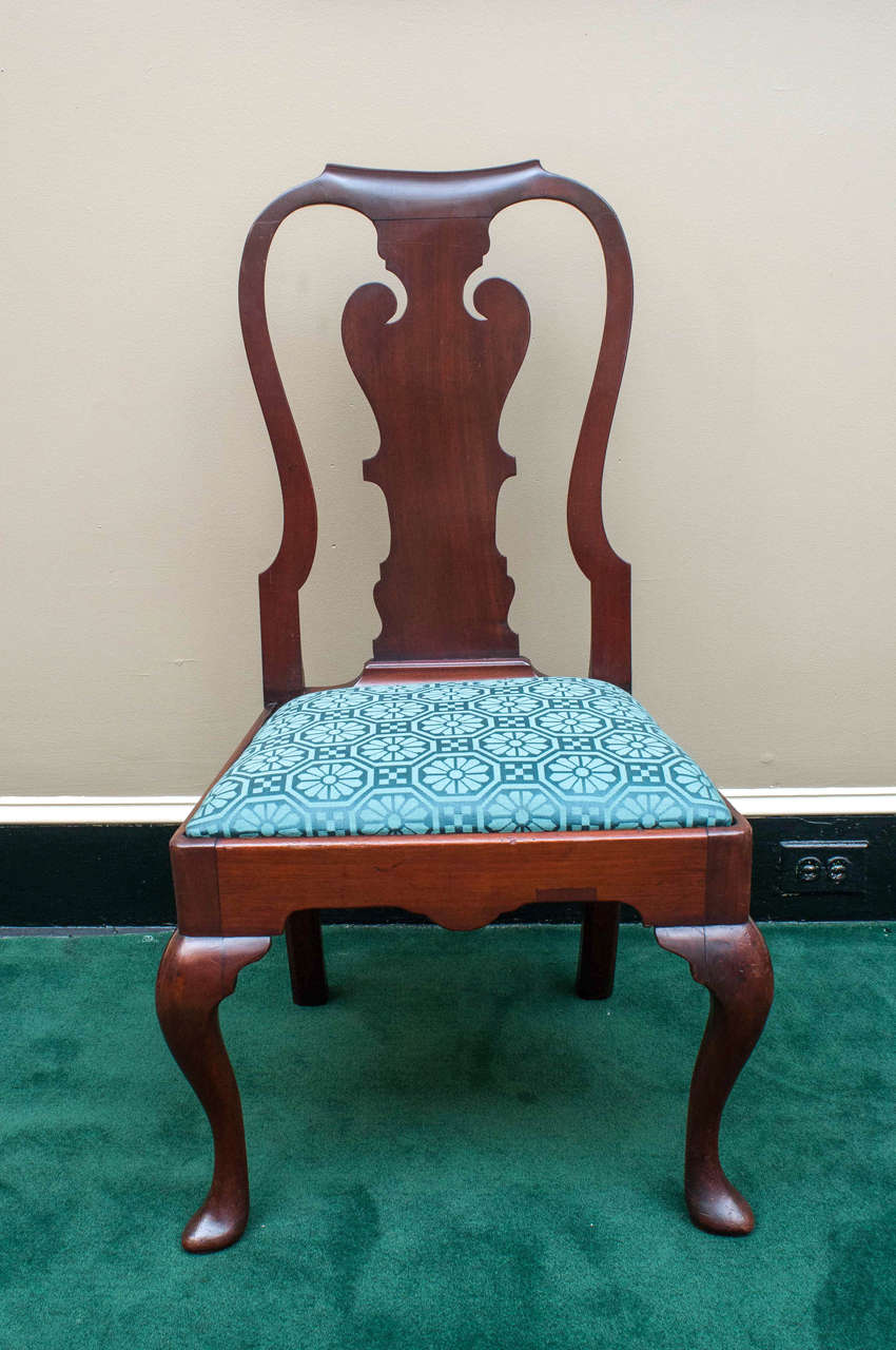 These beautiful chairs have well-proportioned and shaped back splats, do you see the facing curved beak birds in the 