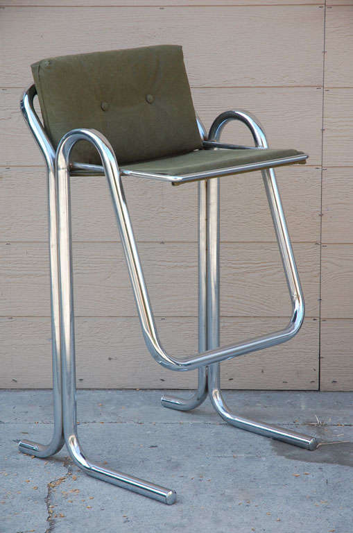 Vintage chrome bar stool, newly upholstered in vintage army tent canvas. Four available, priced individually.