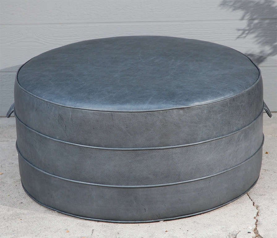 Large leather hassock in custom weathered leather in a Elephant gray.