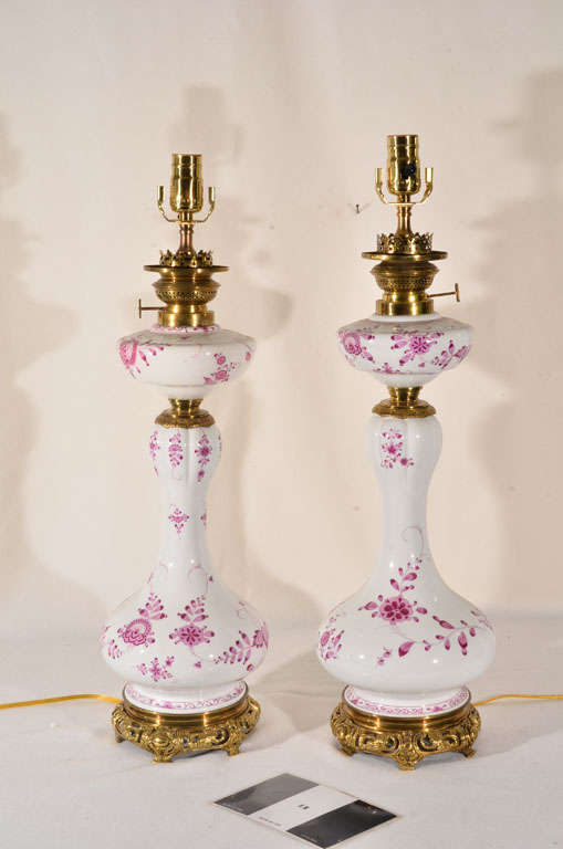 Meissen, Similar, gourd shaped base with original oil font, electrified by Brady's,  in Pink Onion Pattern, with matching cast brass bases and burners, Slightly different heights but can be used as a co-ordinating pair,  Priced @ 2900.00 each.  Both