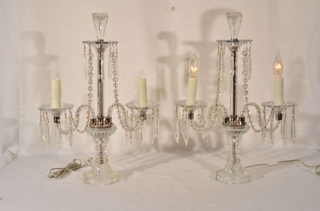 Pressed glass, two light Girandoles,  with pressed glass feather finial, draping chains of crystal from the top bobeche to each candle cup bobeche.  Metal parts are plated a bright shiny nickel.  Candle covers are lovely, natural looking acrylic