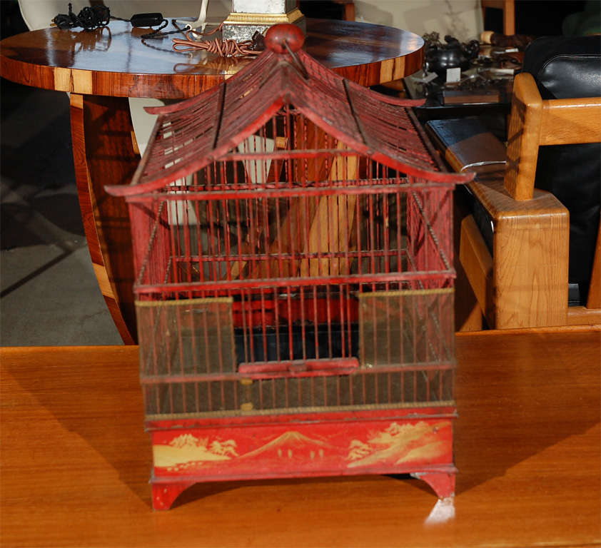 red painted birdcage
