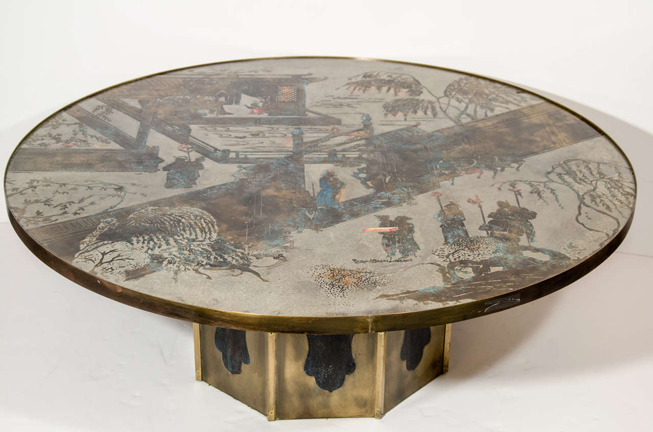 A fine chinoiserie Philip and Kelvin Laverne etched bronze and hand enameled circular coffee table depicting Chinese figural scenes on an octagonal base.
