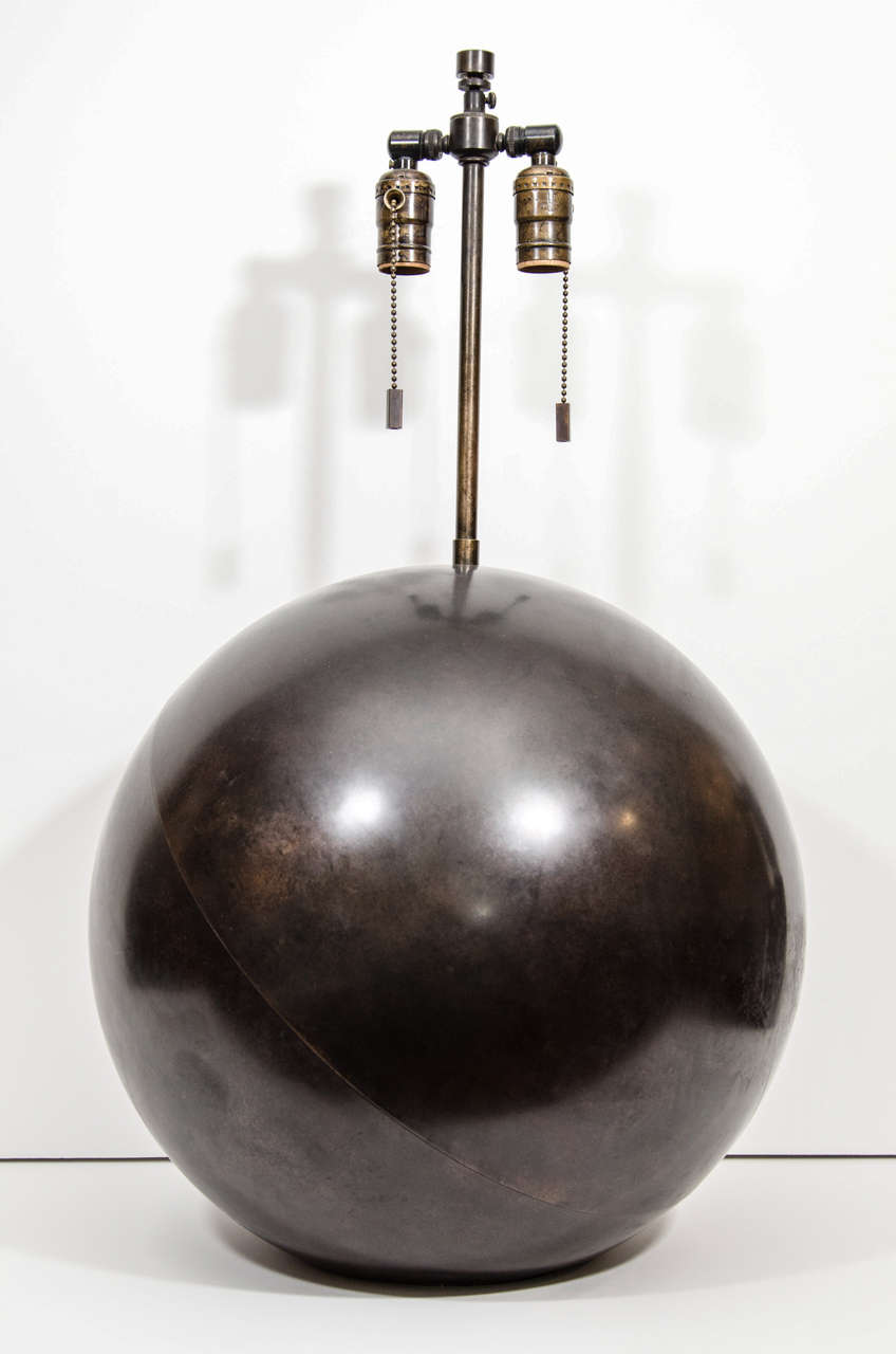 Single bronze spherical lamp by Karl Springer.

View our complete collection at www.johnsalibello.com