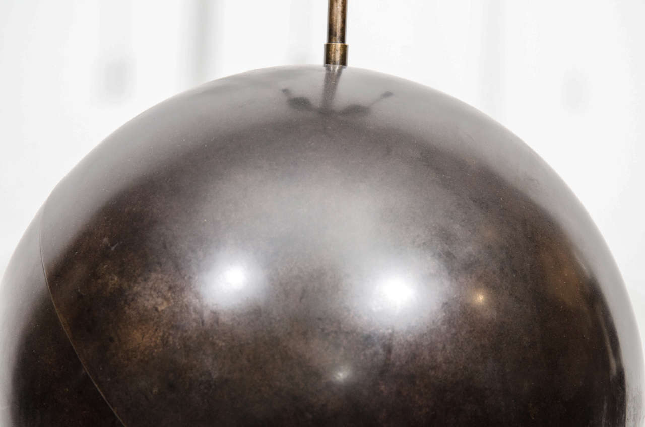 American Single bronze spherical lamp by Karl Springer