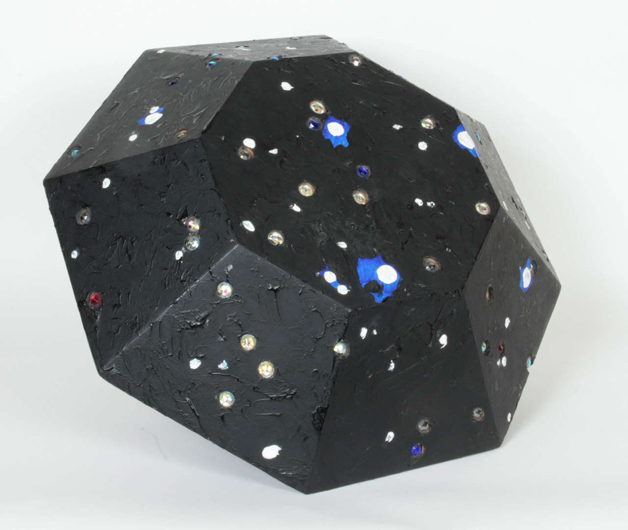 This faceted, geometric sculpture by the contemporary New York artist John Torreano dates to the mid-1980s.